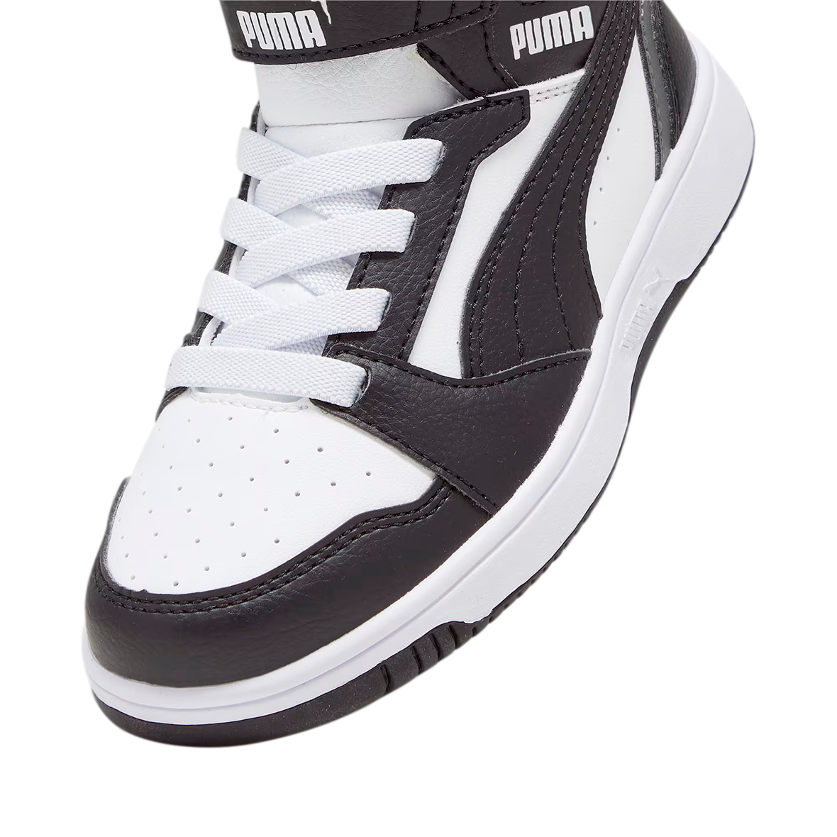 PUMA REBOUND V6 PARA NIÑO COLOR NEGRO BLANCO
